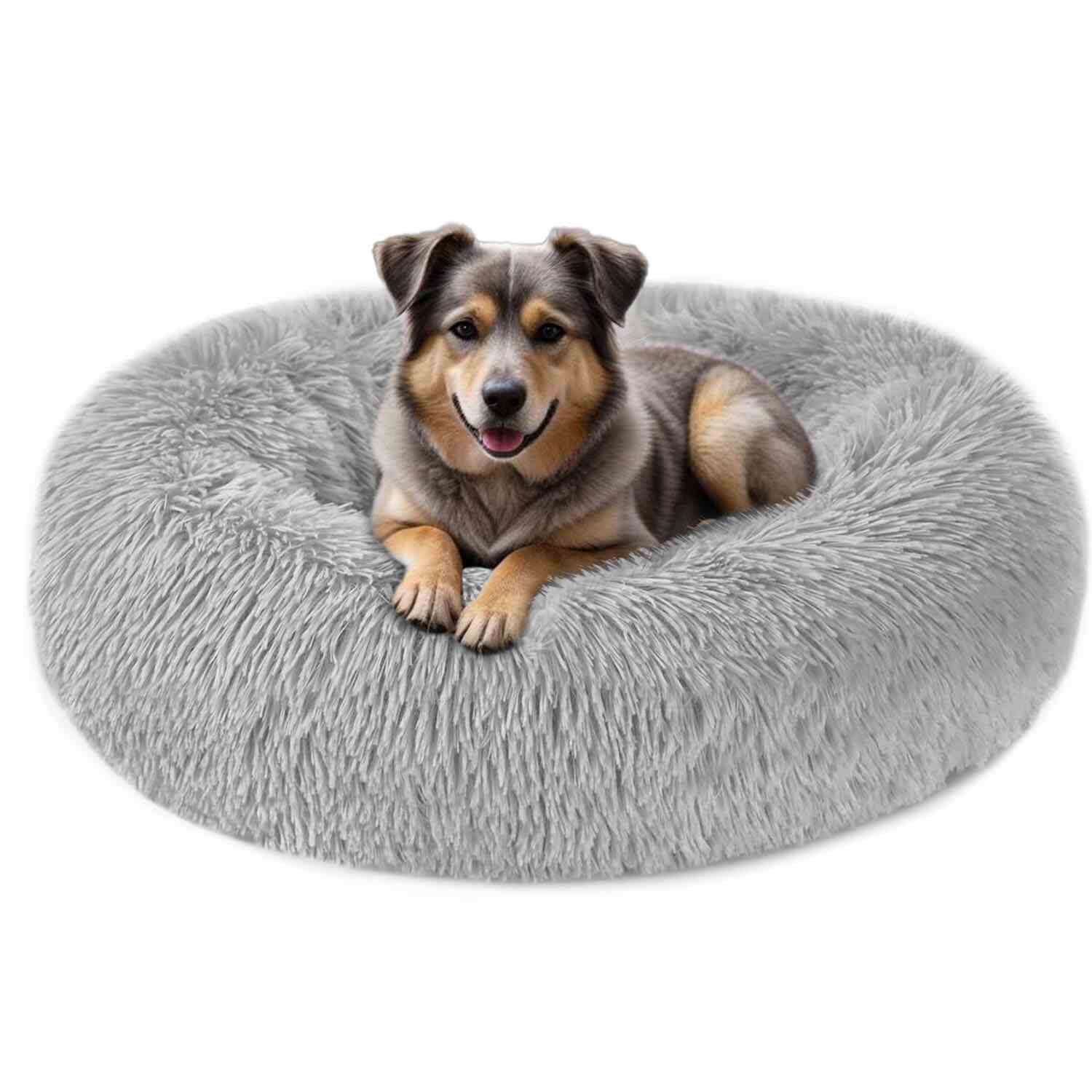a dog is sitting on a grey donut dog Bed